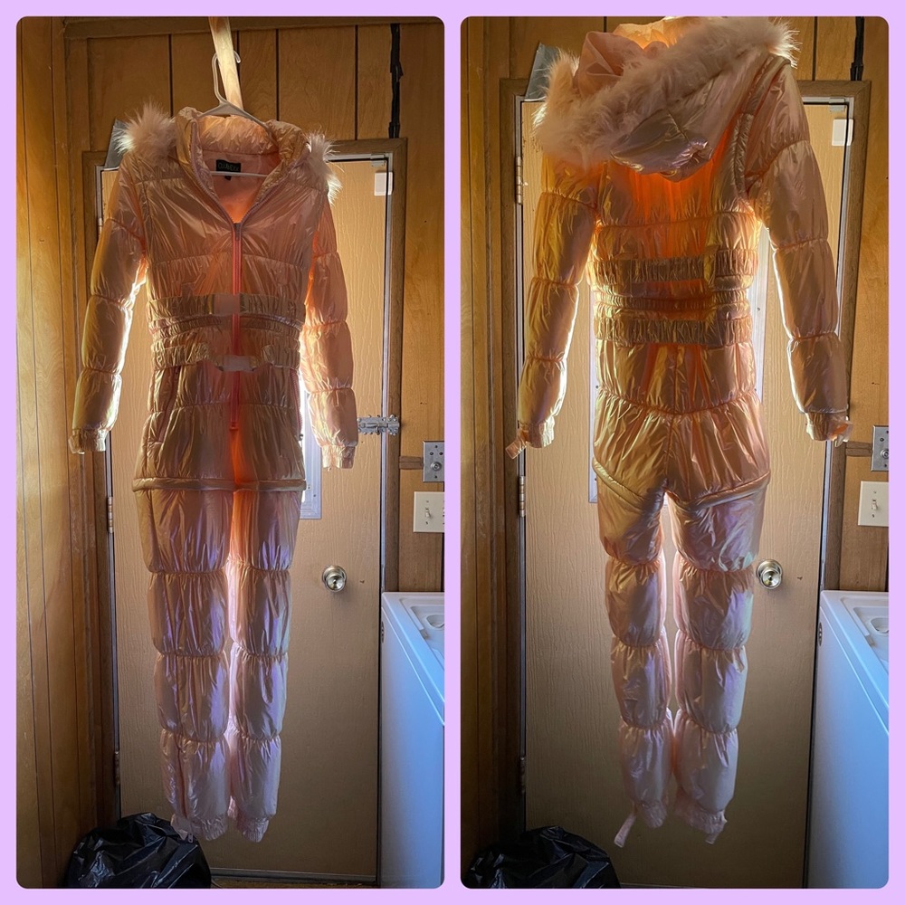 Dollzkill pink holographic size small snowsuit. Removable arms and legs.
